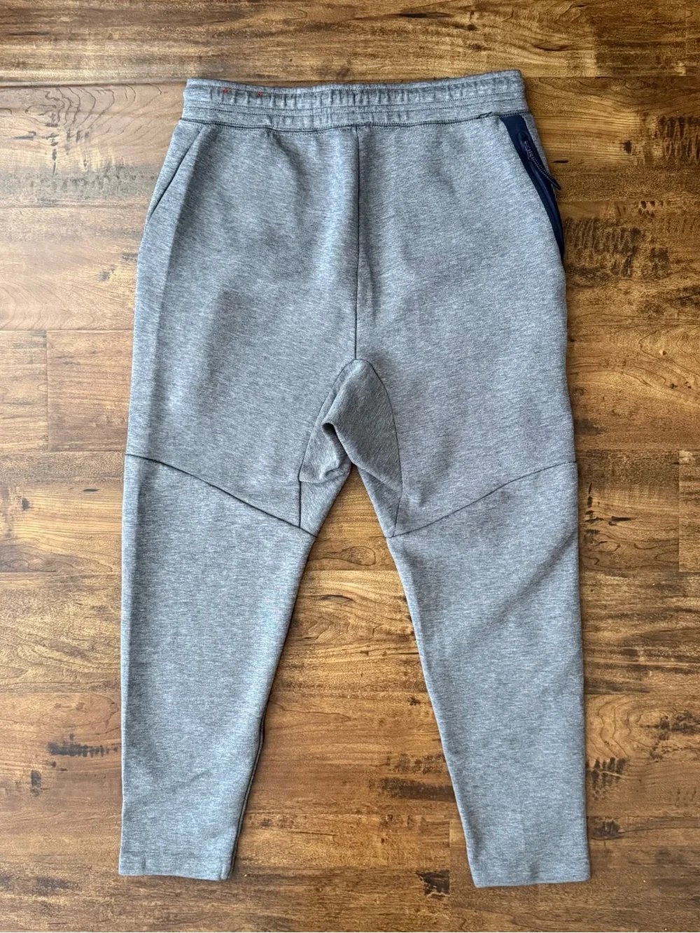 Gray Nike Tech Fleece Joggers with black side stripe